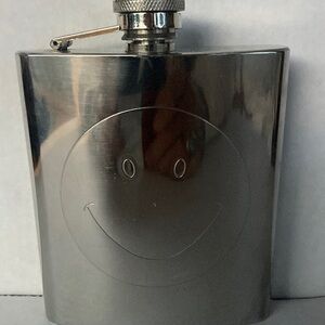Stainless steel flask with smiley face
